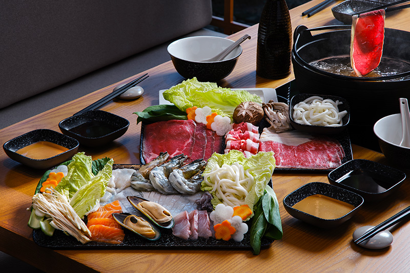 Shabu-shabu with thinly sliced beef, vegetables, and dipping sauce at Hamabe Japanese Restaurant at The Westin Resort Nusa Dua