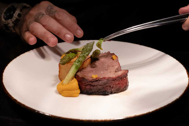 Australian Grain Fed Black Angus Tenderloin Steak served on a white plate at Big Fish Grill Bali The Stones Hotel Legian  -  Dine & Wine Bali Best Restaurant Guide