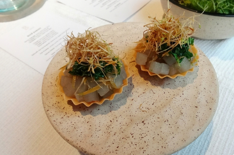 Tartelette with radish, herbs, and crispy garnish at Syrco BAS&Egrave; Ubud tasting menu